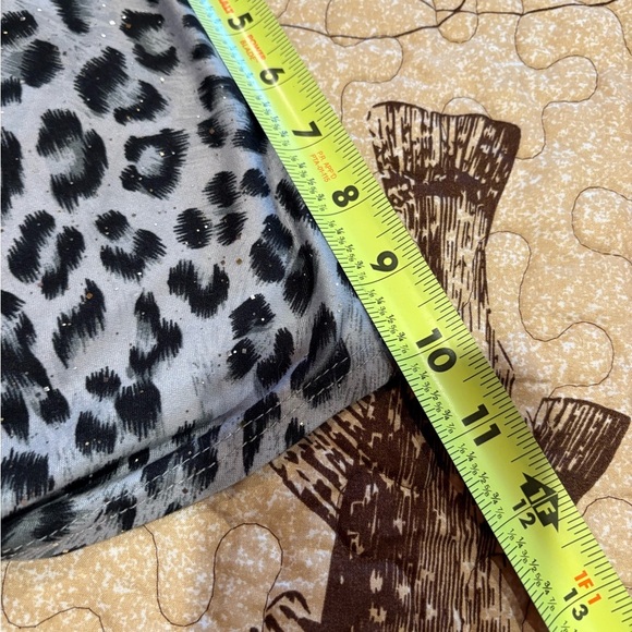 OMT Fashions, women’s size 2X featuring an animal print with subtle sparkles - Picture 9 of 9